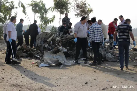 Egyptian police inspect the blast scene in Cairo's eastern district of Naser City, Egypt, on Nov. 4, 2016. An Egyptian judge escaped a car explosion in Cairo's eastern district of Naser City on Friday, the judge was not...