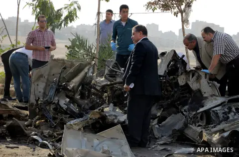 Egyptian police inspect the blast scene in Cairo's eastern district of Naser City, Egypt, on Nov. 4, 2016. An Egyptian judge escaped a car explosion in Cairo's eastern district of Naser City on Friday, the judge was not...