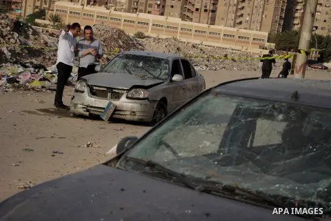 Egyptian police inspect the blast scene in Cairo's eastern district of Naser City, Egypt, on Nov. 4, 2016. An Egyptian judge escaped a car explosion in Cairo's eastern district of Naser City on Friday, the judge was not...