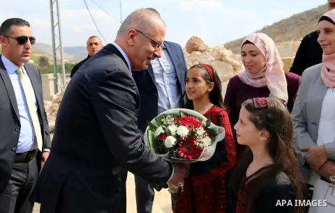 Palestinian Prime Minister, Rami Hamdallah, lays foundation stone for the housing cooperative engineers Tulkarem, in the West Bank city of Ramallah, on November 5, 2016. Photo by Prime Minister Office