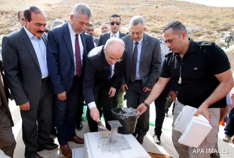 Palestinian Prime Minister, Rami Hamdallah, lays foundation stone for the housing cooperative engineers Tulkarem, in the West Bank city of Ramallah, on November 5, 2016. Photo by Prime Minister Office