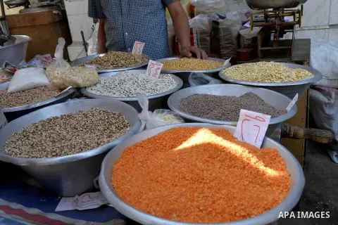Egyptians shop at a market in Cairo, Egypt, on November 7, 2016. Photo by Amr Sayed