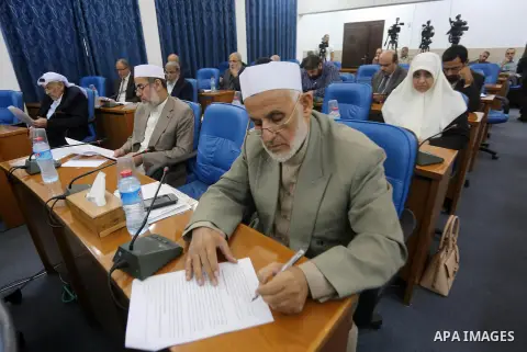 Members of the Palestinian legislative council from Hamas movement attend a meeting at the legislative council in Gaza city, on November 9, 2016. Photo by Mohammed Asad