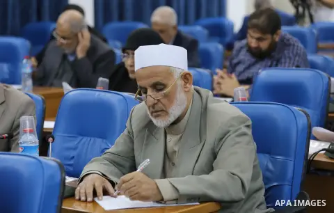 Members of the Palestinian legislative council from Hamas movement attend a meeting at the legislative council in Gaza city, on November 9, 2016. Photo by Mohammed Asad