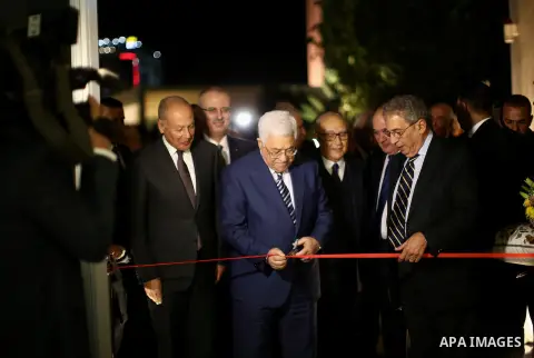 Palestinian President Mahmoud Abbas opens the museum of late Palestinian leader Yasser Arafat with Secretary General of the Arab League Ahmed Aboul Gheit and former Secretary-General of the Arab League Amr Mousa in the W...