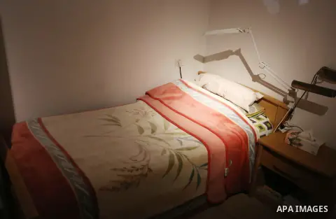 A picture shows a recreation of the small bedroom where late Palestinian leader Yasser Arafat spent his final years at the late Palestinian leader Yasser Arafat's Museum in the West Bank city of Ramallah on November 9, 2...