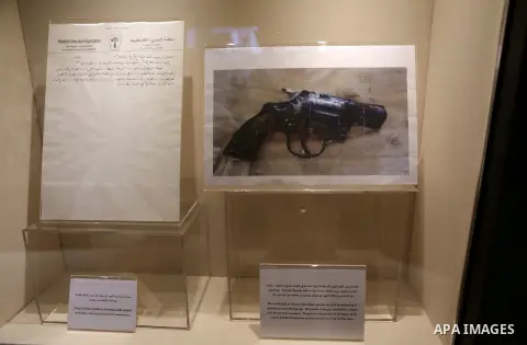 A picture shows a photo of Khalil Al-Wazir's (Abu Jihad) gun and draft of a letter written by Abu Jihad at the late Palestinian leader Yasser Arafat's Museum in the West Bank city of Ramallah on November 9, 2016. The Yas...