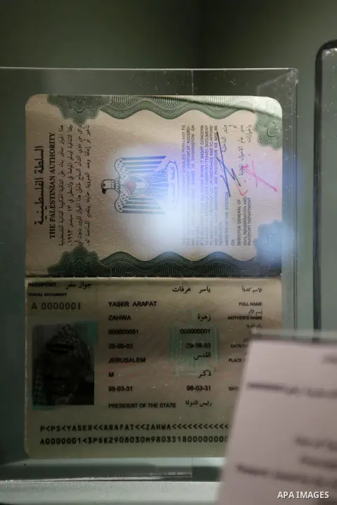 A picture shows Passport, issued by the Palestinian National Authority (000000001) at the late Palestinian leader Yasser Arafat's Museum in the West Bank city of Ramallah on November 9, 2016. The Yasser Arafat Museum ope...