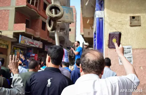 Egyptian supporters of ousted Islamist president Mohammed Morsi and the Muslim Brotherhood, march shouting slogans against the President Abdel Fattah al-Sisi and the military rule in al-Haram neighbourhood in the souther...