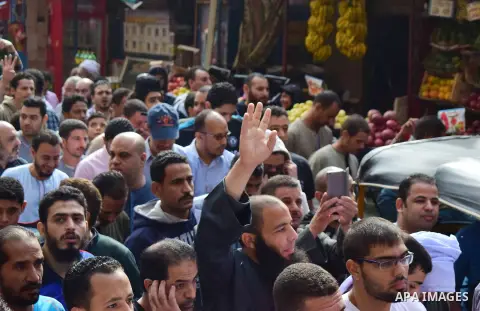 Egyptian supporters of ousted Islamist president Mohammed Morsi and the Muslim Brotherhood, march shouting slogans against the President Abdel Fattah al-Sisi and the military rule in al-Haram neighbourhood in the souther...
