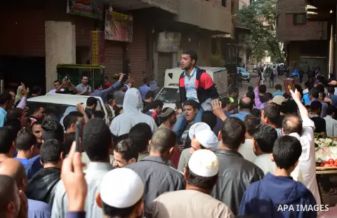 Egyptian supporters of ousted Islamist president Mohammed Morsi and the Muslim Brotherhood, march shouting slogans against the President Abdel Fattah al-Sisi and the military rule in al-Haram neighbourhood in the souther...