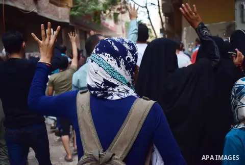Egyptian supporters of ousted Islamist president Mohammed Morsi and the Muslim Brotherhood, march shouting slogans against the President Abdel Fattah al-Sisi and the military rule in al-Haram neighbourhood in the souther...