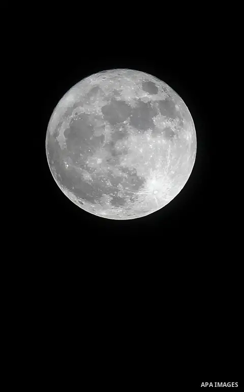 The 'Supermoon' rises over the West Bank city of Hebron on November 14, 2016. The moon will be the closest to Earth since 1948 at a distance of 356,509 kilometres (221,524 miles), creating what NASA described as "an extr...