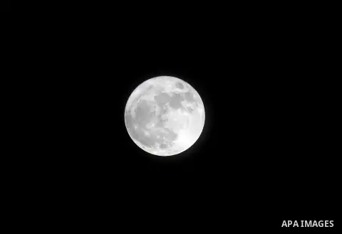 The 'Supermoon' rises over the West Bank city of Hebron on November 14, 2016. The moon will be the closest to Earth since 1948 at a distance of 356,509 kilometres (221,524 miles), creating what NASA described as "an extr...