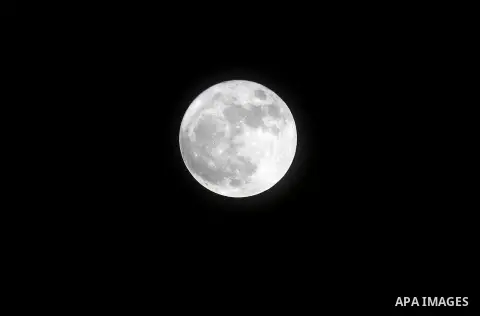 The 'Supermoon' rises over the West Bank city of Hebron on November 14, 2016. The moon will be the closest to Earth since 1948 at a distance of 356,509 kilometres (221,524 miles), creating what NASA described as "an extr...