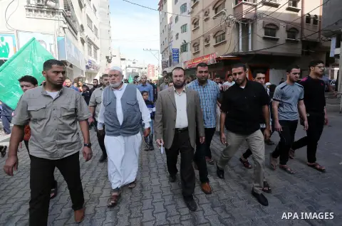 Palestinian Hamas supporters take part during a protest against a controversial Israeli bill to limit the volume of calls to prayer at mosques in the occupied Jerusalem, in Jabalia in the northern Gaza Strip, on Nov. 18,...
