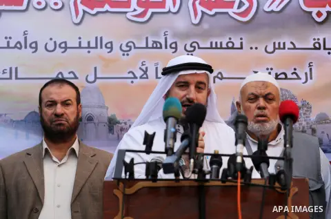 Palestinian Hamas supporters take part during a protest against a controversial Israeli bill to limit the volume of calls to prayer at mosques in the occupied Jerusalem, in Jabalia in the northern Gaza Strip, on Nov. 18,...
