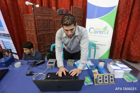 Palestinians take part during technology exhibition funded by Islamic Development Bank in Jeddah, at the Islamic University in Gaza city, on Nov. 20, 2016. Photo by Mohammed Asad