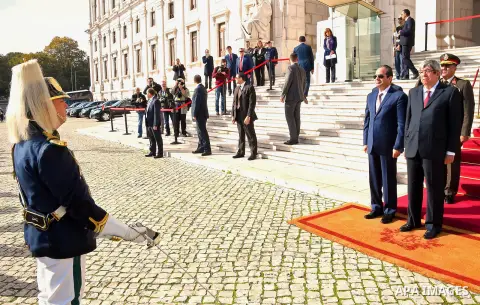 Speaker of the Portuguese Parliament Eduardo Ferro Rodrigues and Egyptian President Abdel Fattah al-Sisi review an honor guard during his visit to Portuguese Parliament in Lisbon, Portugal, 22 November 2016. Photo by Egy...
