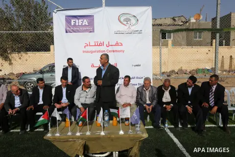 Alexander Gross, the development of FIFA's program in Asia director attends the inauguration ceremony of play field in Gaza city, on Nov. 23, 2016. Photo by Mohammed Asad