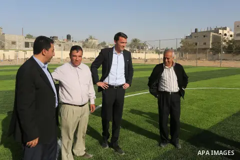 Alexander Gross, the development of FIFA's program in Asia director attends the inauguration ceremony of play field in Gaza city, on Nov. 23, 2016. Photo by Mohammed Asad