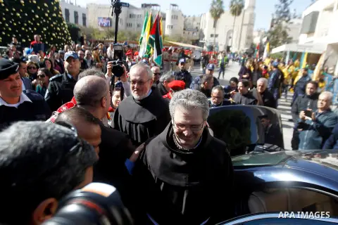 Custodian of the Holy Land Father Francesco Patton arrives to the church of Nativity to ceremonially launch the beginning of the Christmas season, in the West Bank city of Bethlehem November 26, 2016. Photo by Wisam Hash...