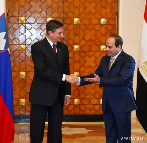 Egyptian President Abdel Fattah al-Sisi shake hands with Slovenian President Borut Pahor, before a meeting in Cairo, Egypt, on December 05, 2016. Photo by Egyptian President Office