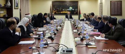 Palestinian Prime Minister, Rami Hamdallah, chairs a meeting of the council Ministers, in the West Bank city of Ramallah, on December 6, 2016. Photo by Prime Minister Office