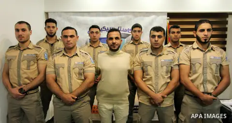 Palestinian private security guards from Castle Security company take part in a work day in Gaza City on December 08, 2016. Photo by Ashraf Amra
