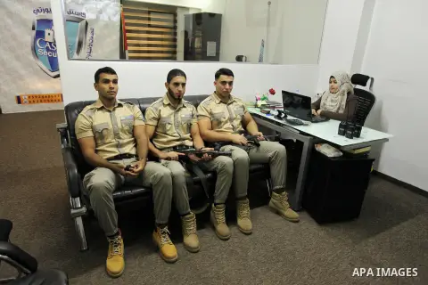 Palestinian private security guards from Castle Security company take part in a work day in Gaza City on December 08, 2016. Photo by Ashraf Amra