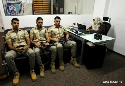 Palestinian private security guards from Castle Security company take part in a work day in Gaza City on December 08, 2016. Photo by Ashraf Amra