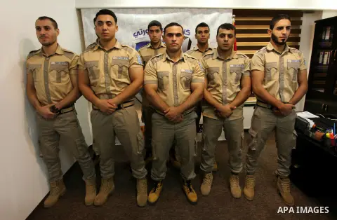 Palestinian private security guards from Castle Security company take part in a work day in Gaza City on December 08, 2016. Photo by Ashraf Amra