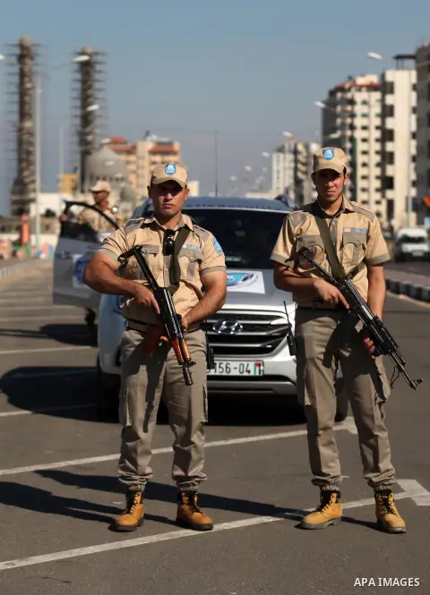 Palestinian private security guards from Castle Security company take part in an exercise during a simulation on how to secure important characters, in Gaza City on December 08, 2016. Photo by Ashraf Amra