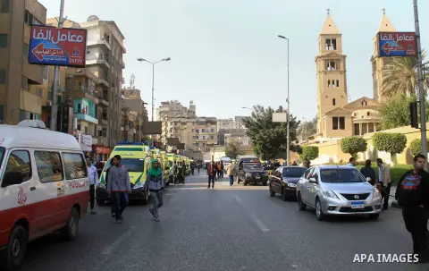 Egyptians inspect the scene of a bomb explosion at the Saint Peter and Saint Paul Coptic Orthodox Church on December 11, 2016, in Cairo's Abbasiya neighbourhood. The blast killed at least 25 worshippers during Sunday mas...