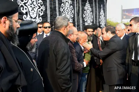 Egyptian President Abdel Fattah al-Sisi attends the funeral of the victims of a bomb explosion that targeted a Coptic Orthodox Church in Cairo, on December 12, 2016. Photo by Egyptian President Office
