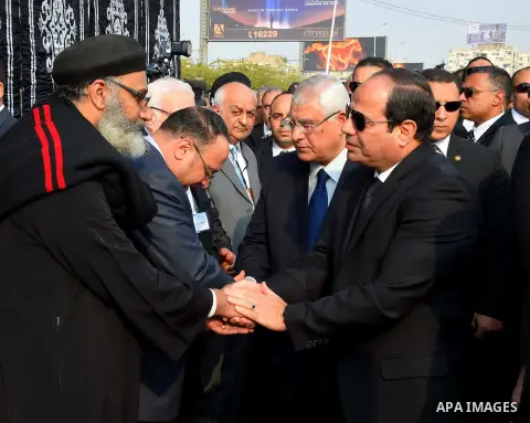 Egyptian President Abdel Fattah al-Sisi attends the funeral of the victims of a bomb explosion that targeted a Coptic Orthodox Church in Cairo, on December 12, 2016. Photo by Egyptian President Office