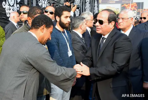Egyptian President Abdel Fattah al-Sisi attends the funeral of the victims of a bomb explosion that targeted a Coptic Orthodox Church in Cairo, on December 12, 2016. Photo by Egyptian President Office