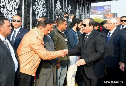 Egyptian President Abdel Fattah al-Sisi attends the funeral of the victims of a bomb explosion that targeted a Coptic Orthodox Church in Cairo, on December 12, 2016. Photo by Egyptian President Office