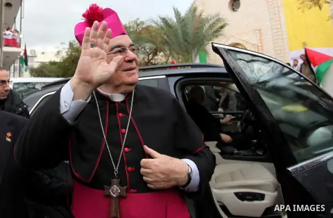 English cardinal Vincent Nichols, Archbishop of Westminster, leads a Sunday mass at Der Latin church in Gaza City on December 18, 2016. Photo by Ashraf Amra