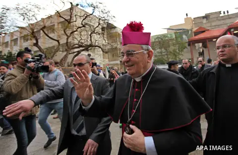 English cardinal Vincent Nichols, Archbishop of Westminster, leads a Sunday mass at Der Latin church in Gaza City on December 18, 2016. Photo by Ashraf Amra