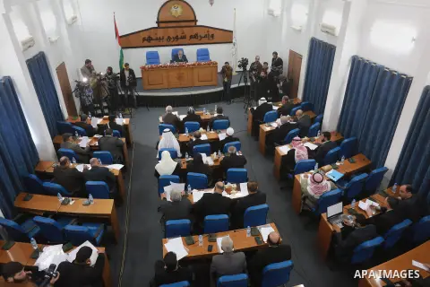 Members of the Palestinian legislative council from Hamas movement attend a meeting at the legislative council in Gaza city, on December 21, 2016. Photo by Mohammed Asad