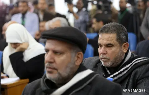 Members of the Palestinian legislative council from Hamas movement attend a meeting at the legislative council in Gaza city, on December 21, 2016. Photo by Mohammed Asad