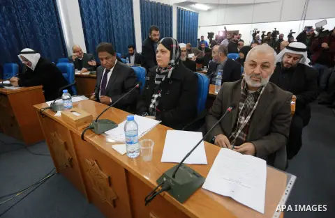 Members of the Palestinian legislative council from Hamas movement attend a meeting at the legislative council in Gaza city, on December 21, 2016. Photo by Mohammed Asad