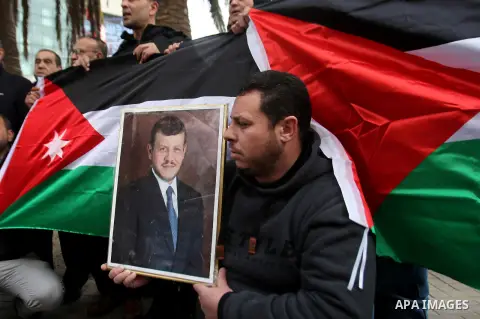 Palestinians take part during a protest to show solidarity with Jordan against terrorist attacks in the West Bank city of Nablus, on December 21, 2016. Jordanian security forces have arrested a man suspected of funding a...