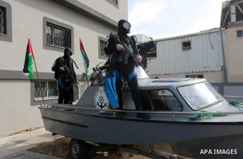 Palestinian Hamas naval security forces take part in the opening ceremony of the first headquarters a newly created marine police unit, in Gaza City, on December 22, 2016. Photo by Mohammed Asad