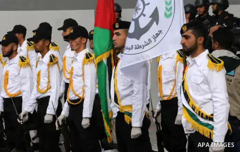 Palestinian Hamas naval security forces take part in the opening ceremony of the first headquarters a newly created marine police unit, in Gaza City, on December 22, 2016. Photo by Mohammed Asad