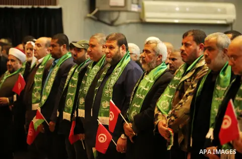 Palestinians attend a memorial service for a Tunisian Mohamed Zaouari, who was murdered in Tunisia in Gaza city on December 26, 2016. Zaouari, 49, was murdered at the wheel of his car outside his house in Tunisia's secon...