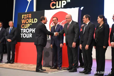 A handout picture released by the Egyptian Presidency on March 15, 2018 shows Egyptian President Abdel Fattah al-Sisi Receives a delegation from the official trophy tours the globe ahead of the 2018 FIFA World Cup tourna...