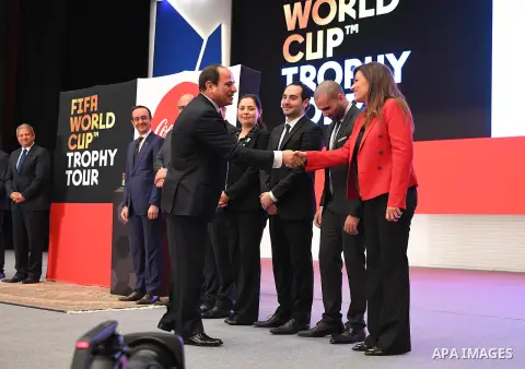 A handout picture released by the Egyptian Presidency on March 15, 2018 shows Egyptian President Abdel Fattah al-Sisi Receives a delegation from the official trophy tours the globe ahead of the 2018 FIFA World Cup tourna...