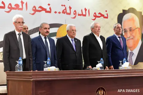 Palestinian President Mahmoud Abbas meets with members of Fatah movement youth, in the West Bank city of Ramallah, June 15, 2019. Photo by Thaer Ganaim